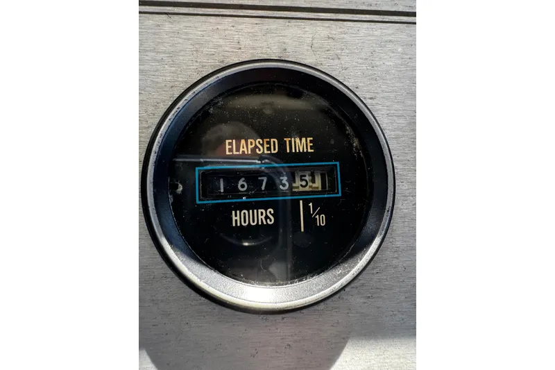 Slide: The Image of Elapsed time gauge showing 1687.9 hours on 1986 Carver 42 Aft Cabin Motor Yacht. - 36