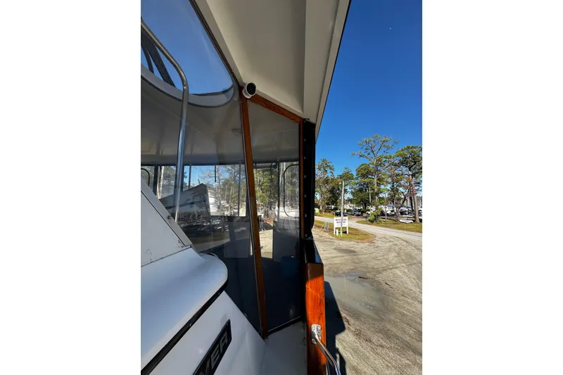 Slide: The Image of eisenglass rolled up at entry. The glass is in good condition - 44