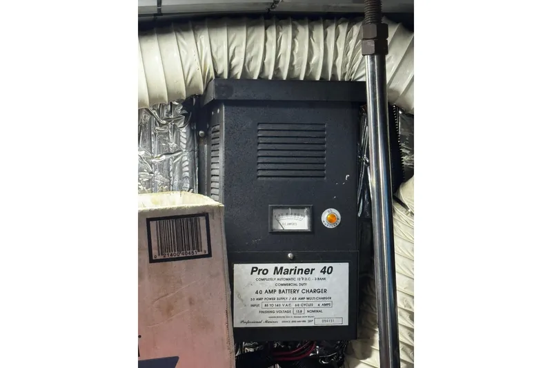 Slide: The Image of Compass on 1986 Carver 42 Aft Cabin Motor Yacht dashboard, with gauges visible. - 56