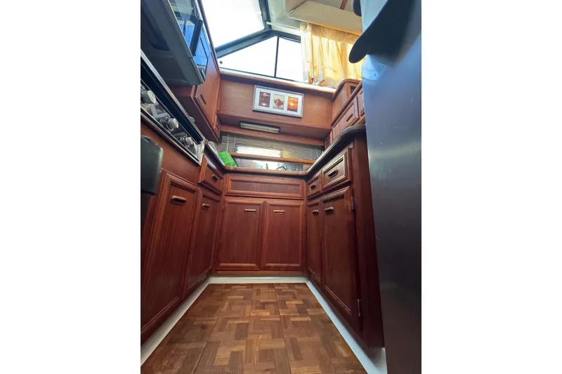 Slide: The Image of Victron Energy SmartSolar charge controller and DC isolator switch on 1986 Carver 42 Aft Cabin Yacht. - 98