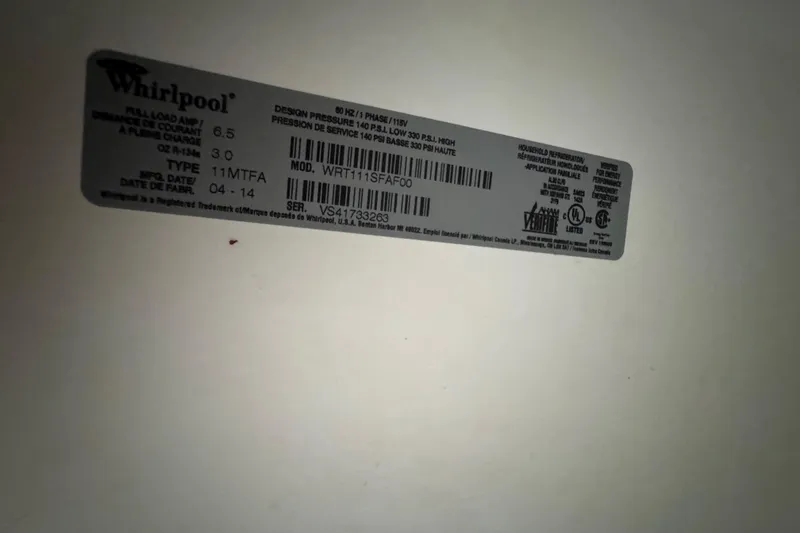 Slide: The Image of Bathroom interior of 1986 Carver 42 Aft Cabin Motor Yacht with wood accents and dual sinks. - 101