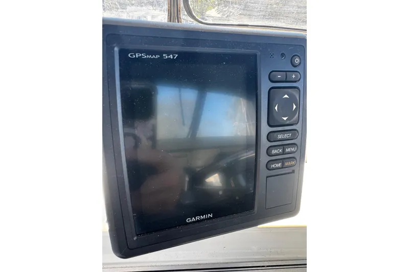 Slide: The Image of Richie Compass on 1986 Carver 42 Aft Cabin Motor Yacht dashboard. - 33