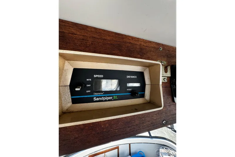 Slide: The Image of Depth gauge and radio equipment on 1986 Carver 42 Aft Cabin Motor Yacht. - 38