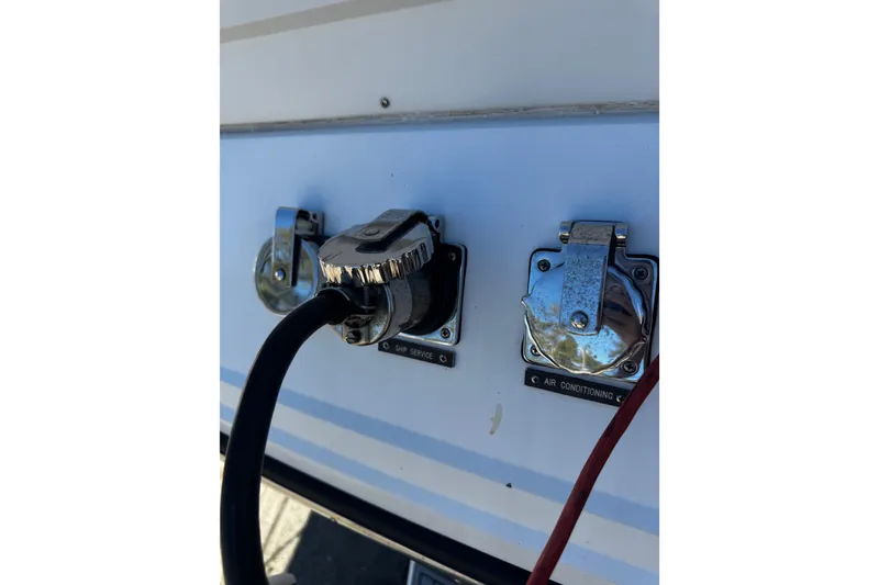 Slide: The Image of 1986 Carver 42 Aft Cabin Motor Yacht with clear blue sky background. - 5