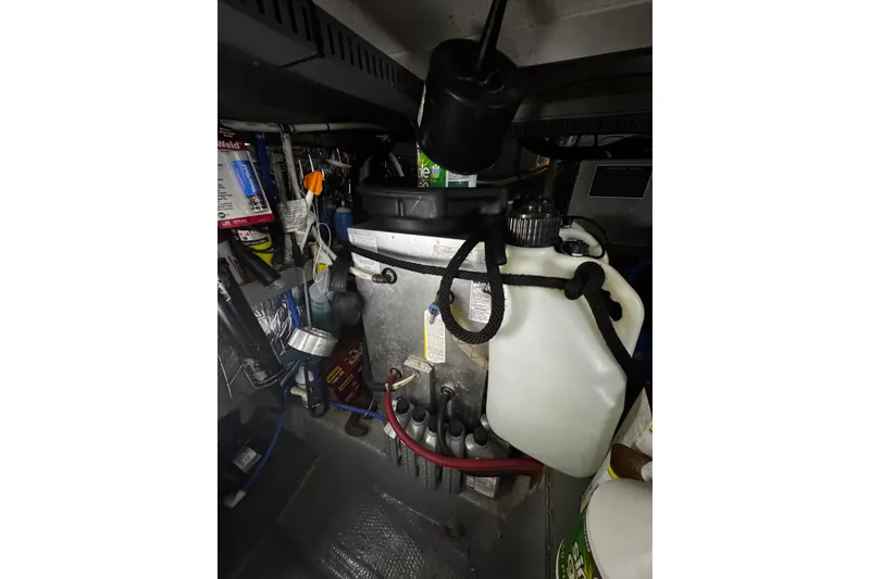 Slide: The Image of Interior of 1986 Carver 42 Aft Cabin Motor Yacht with cozy seating and nautical decor. - 53