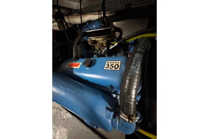 Slide: The Image of Control panel of a 1986 Carver 42 Aft Cabin Motor Yacht with gauges and throttle. - 59