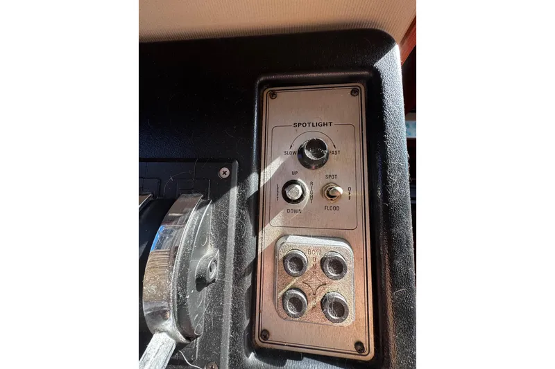 Slide: The Image of Control panel of a 1986 Carver 42 Aft Cabin Motor Yacht, featuring switches and labels. - 65