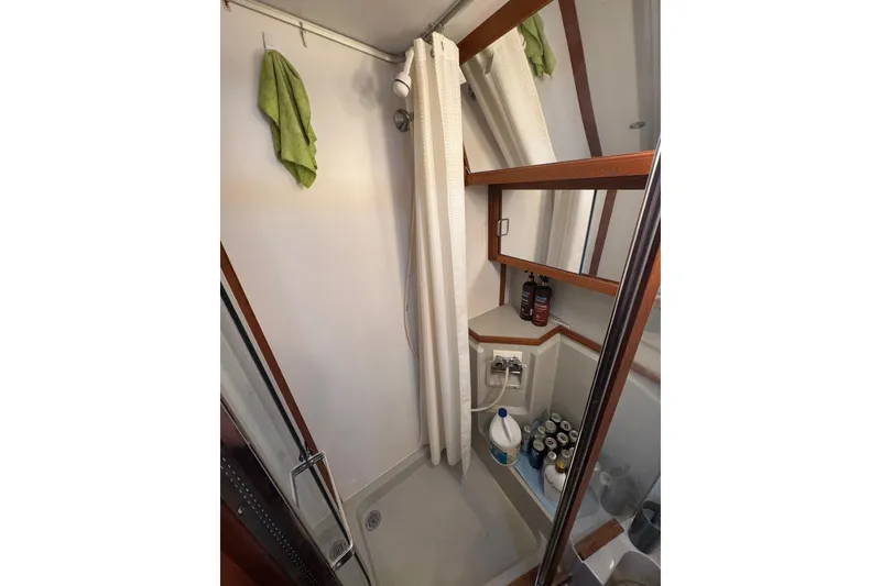 Slide: The Image of Battery installation on 1986 Carver 42 Aft Cabin Motor Yacht, featuring Battle Born LiFePO4 battery. - 96