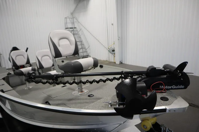 Slide: The Image of 2024 Starcraft Patriot 14 TL boat with MotorGuide trolling motor and comfortable seating. - 11