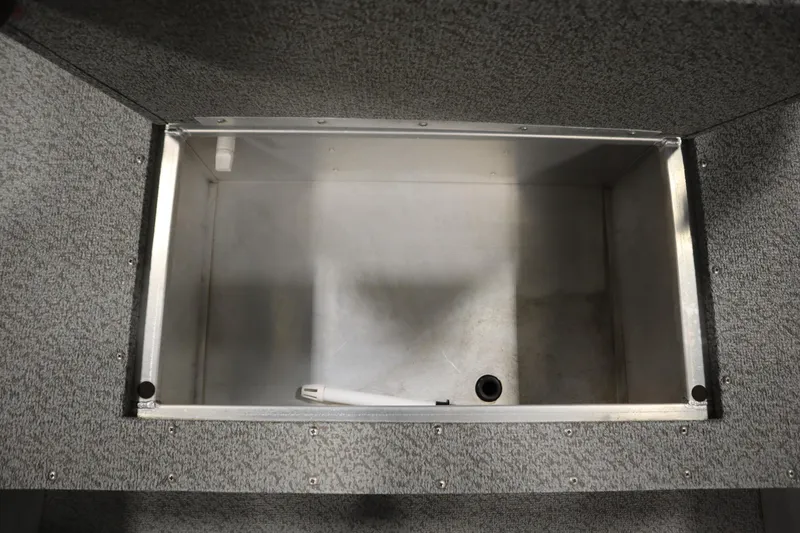 Slide: The Image of 2024 Starcraft Patriot 14 TL boat storage compartment, interior view. - 19