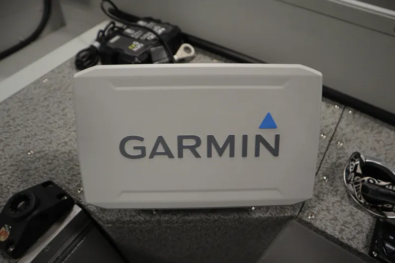 Slide: The Image of Garmin device on 2024 Starcraft Patriot 14 TL boat dashboard. - 25