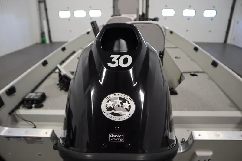 Slide: The Image of 2024 Starcraft Patriot 14 TL boat with ultra-low emission engine in a garage. - 36