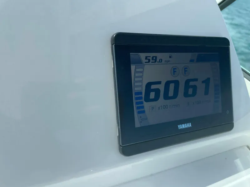 Slide: The Image of Yamaha display on 2022 Albemarle 27 DC boat showing engine RPM and speed. - 19