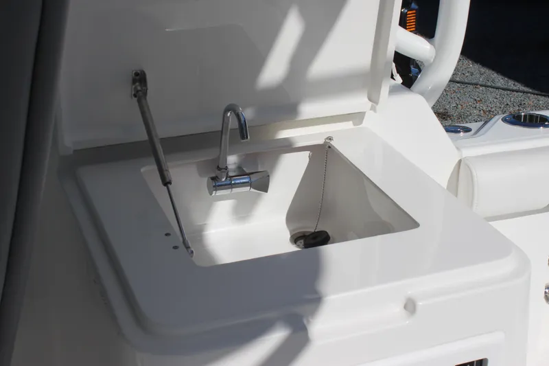 Slide: The Image of 2022 Albemarle 27 DC boat sink with faucet and cover. - 30