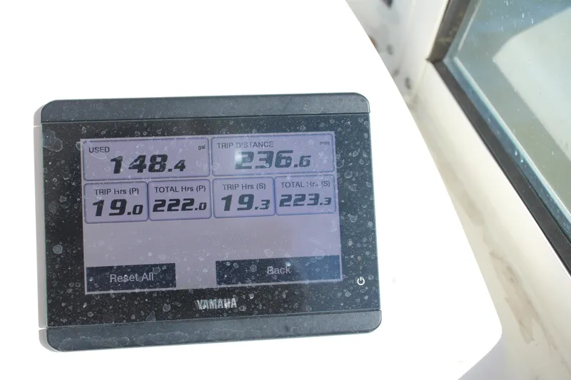 Slide: The Image of Yamaha display showing fuel usage and trip data on 2022 Albemarle 27 DC boat. - 32