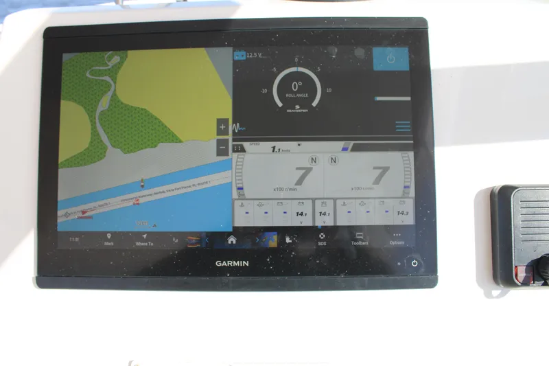 Slide: The Image of Garmin navigation display on 2022 Albemarle 27 DC boat dashboard. - 35