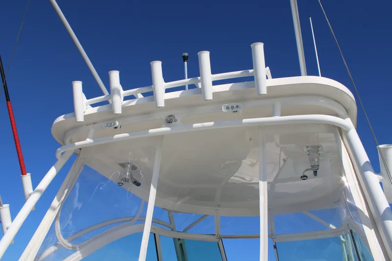 Slide: The Image of 2022 Albemarle 27 DC boat tower against clear blue sky. - 43