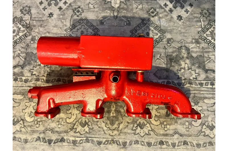 Slide: The Image of Red engine manifold for 1987 Bristol 41.1 Aft Cockpit on patterned surface. - 14