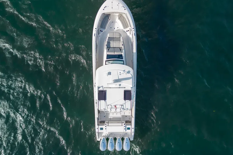 Slide: The Image of Aerial view of 2022 Pursuit S 428 Sport boat on open water. - 10