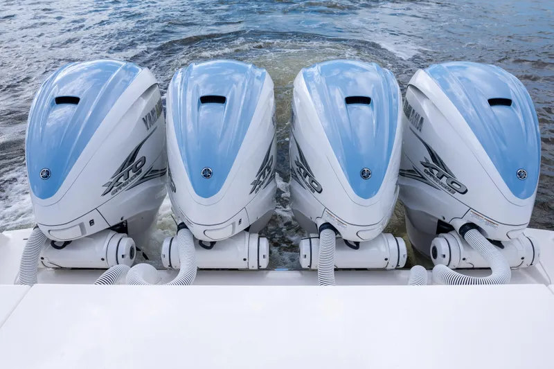 Slide: The Image of Four Yamaha XTO outboard engines on a 2022 Pursuit S 428 Sport boat. - 12