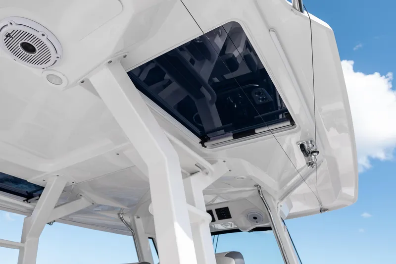 Slide: The Image of 2022 Pursuit S 428 Sport boat roof detail against blue sky. - 28