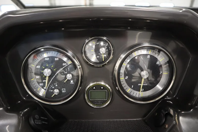 Slide: The Image of Dashboard of 2021 Bayliner VR5 Bowrider OB with speedometer and tachometer gauges. - 20
