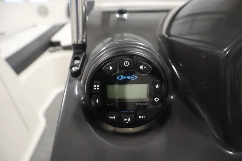 Slide: The Image of Jensen marine audio system on 2021 Bayliner VR5 Bowrider OB boat dashboard. - 21