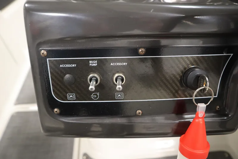 Slide: The Image of Control panel of 2021 Bayliner VR5 Bowrider OB with bilge pump and accessory switches. - 22