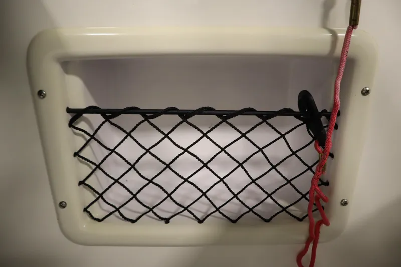 Slide: The Image of Storage net on 2021 Bayliner VR5 Bowrider OB boat. - 25