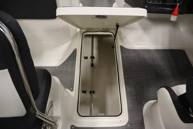 Slide: The Image of 2021 Bayliner VR5 Bowrider OB interior storage compartment, open view. - 29
