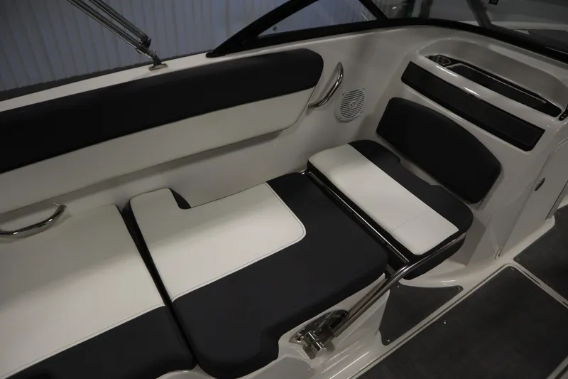 Slide: The Image of 2021 Bayliner VR5 Bowrider OB interior seating with black and white upholstery. - 37