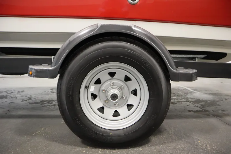 Slide: The Image of 2021 Bayliner VR5 Bowrider OB trailer wheel, close-up view. - 50