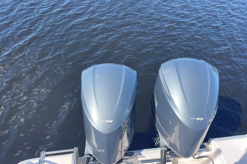 Slide: The Image of Twin Yamaha V8 outboard engines on a 2011 Grady-White Freedom 307 boat. - 10