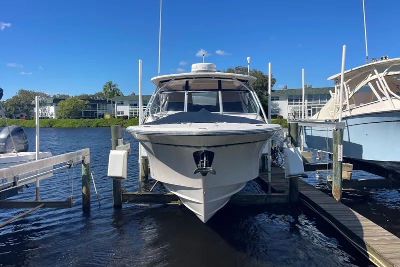 Slide: The Image of Interior view of 2011 Grady-White Freedom 307 boat with Garmin navigation system. - 14