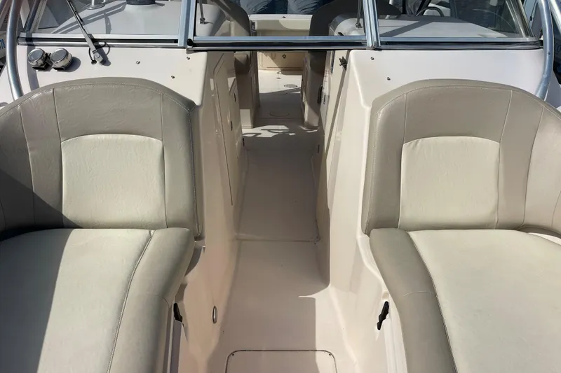 Slide: The Image of Twin Yamaha V8 outboard engines on a 2011 Grady-White Freedom 307 boat. - 9