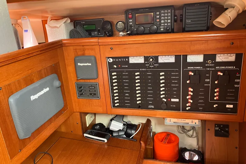 Slide: The Image of Control panel of a 2002 Hunter 460 sailboat with Raymarine equipment. - 7