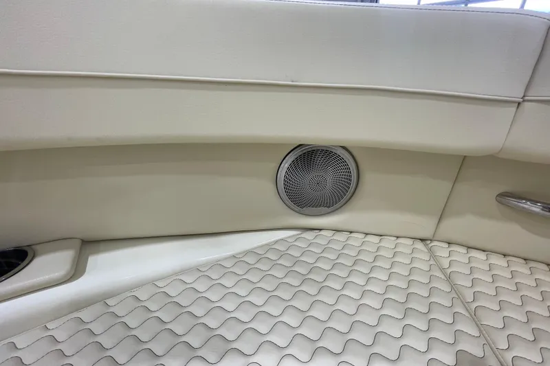 Slide: The Image of 2026 Chris-Craft Launch 31 GT interior with speaker and textured flooring. - 17