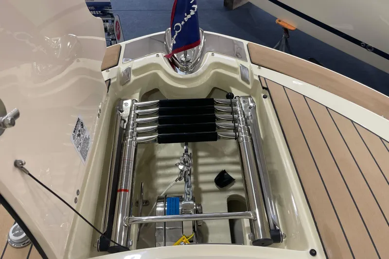 Slide: The Image of 2026 Chris-Craft Launch 31 GT boat anchor compartment with stainless steel fittings. - 2
