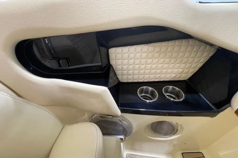 Slide: The Image of 2026 Chris-Craft Launch 31 GT interior with cup holders and quilted leather accents. - 21