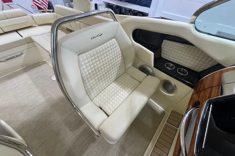 Slide: The Image of Luxurious interior of 2026 Chris-Craft Launch 31 GT with elegant seating and cup holders. - 23