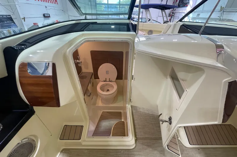 Slide: The Image of 2026 Chris-Craft Launch 31 GT boat interior with compact bathroom and modern amenities. - 26