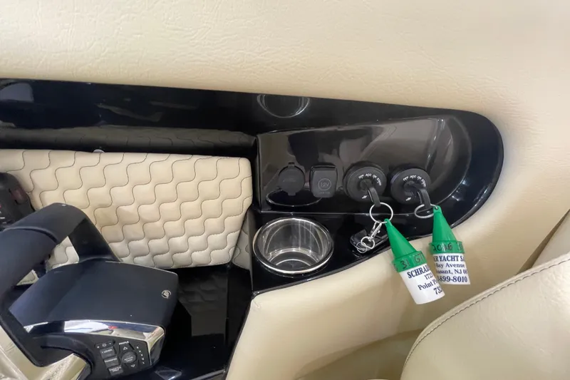 Slide: The Image of 2026 Chris-Craft Launch 31 GT dashboard with quilted leather and control panel. - 36