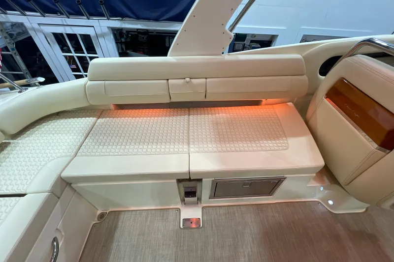Slide: The Image of Luxurious interior of 2026 Chris-Craft Launch 31 GT boat with elegant seating and ambient lighting. - 45