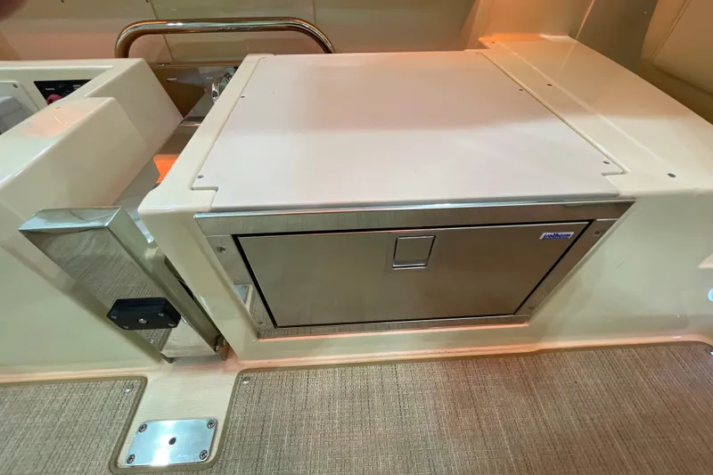 Slide: The Image of 2026 Chris-Craft Launch 31 GT interior with built-in stainless steel drawer. - 48