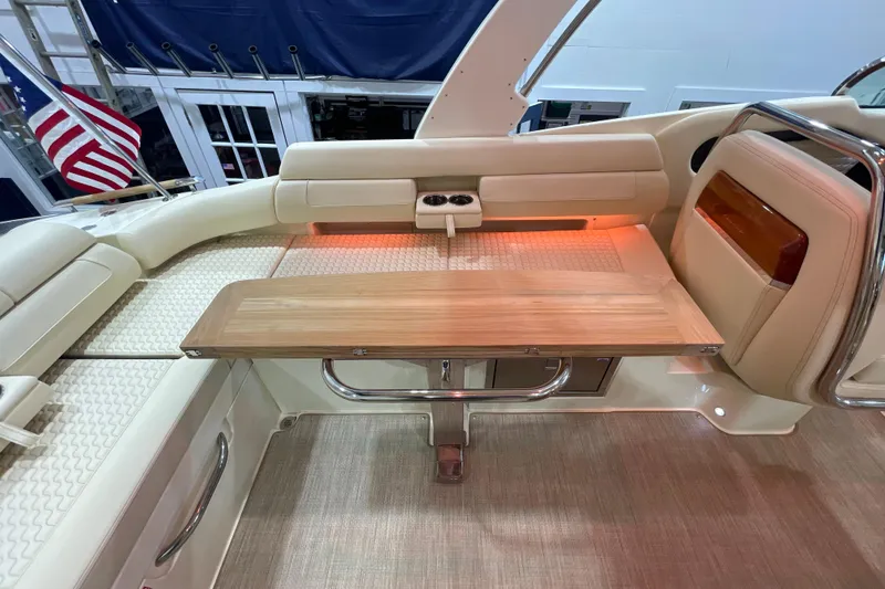 Slide: The Image of Luxurious interior of 2026 Chris-Craft Launch 31 GT with elegant seating and wooden table. - 53