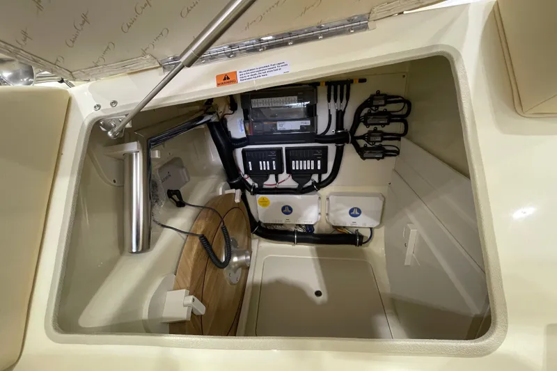 Slide: The Image of Electrical compartment of 2026 Chris-Craft Launch 31 GT boat, showcasing wiring and components. - 6