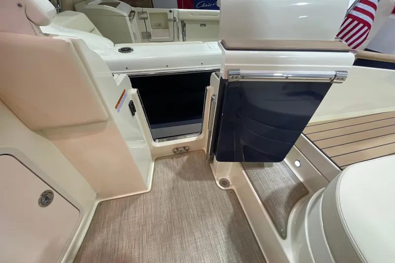 Slide: The Image of 2026 Chris-Craft Launch 31 GT interior with open door and elegant flooring. - 61