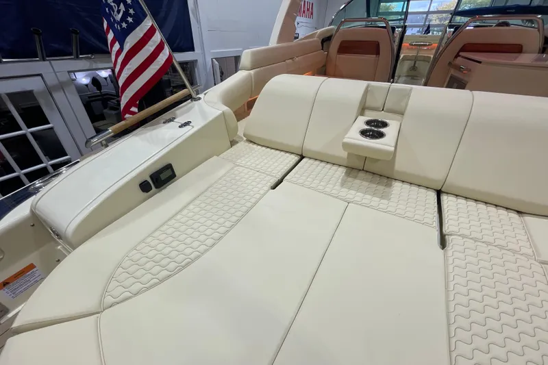 Slide: The Image of 2026 Chris-Craft Launch 31 GT boat interior with luxurious seating and cup holders. - 68