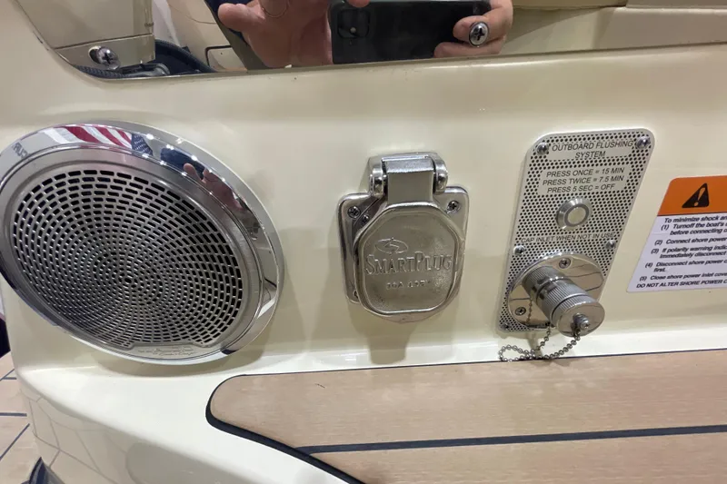 Slide: The Image of 2026 Chris-Craft Launch 31 GT boat features SmartPlug and outboard flushing system. - 75