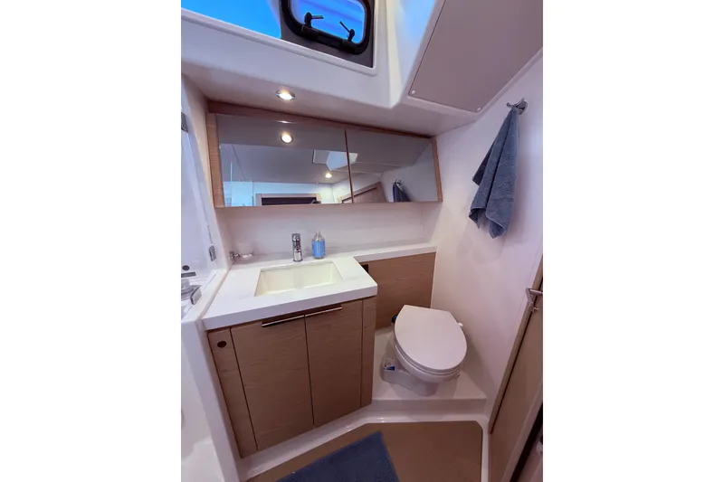 Slide: The Image of Modern bathroom in 2022 Beneteau Oceanis Yacht 54, featuring sleek design and amenities. - 41
